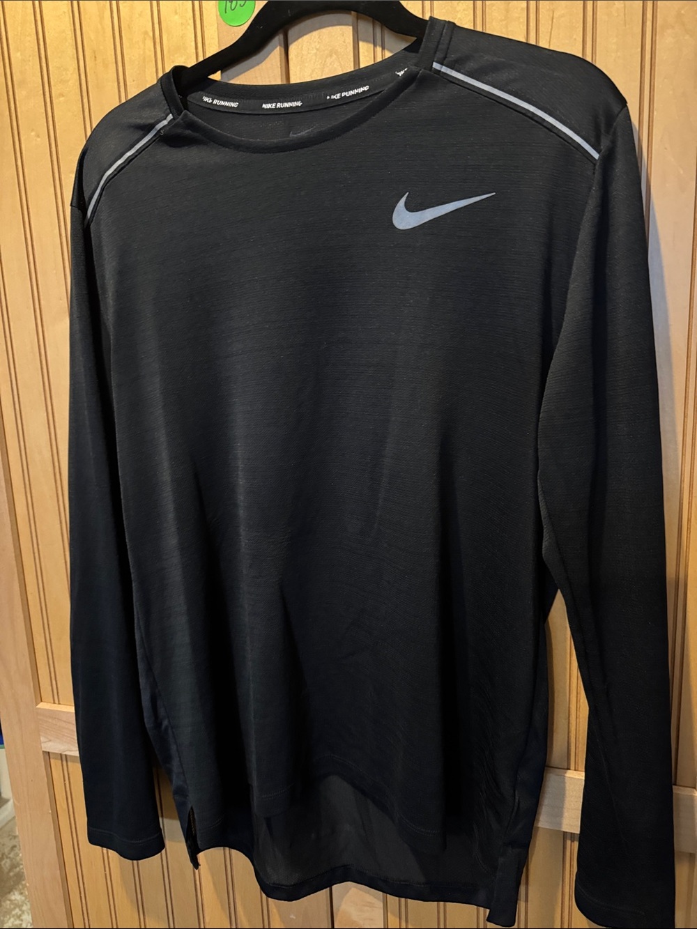 Nike Black Long Sleeve Athletic Top with Reflective Swoosh
